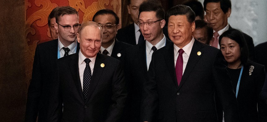 Russia's President Vladimir Putin (front L) and China's President Xi Jinping (C) in Beijing, China, on April 26, 2019.